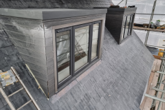 Roof extension and skylight fitting