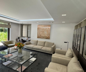 Luxury living room refurbishment in Notting Hill London featuring bespoke cabinetry, modern furnishings and contemporary interior design