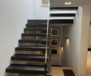 Contemporary staircase refurbishment in Notting Hill London featuring floating timber stairs and modern interior design